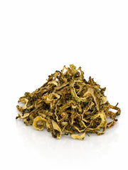 Premium dehydrated bitter gourd (karela) slices on white background