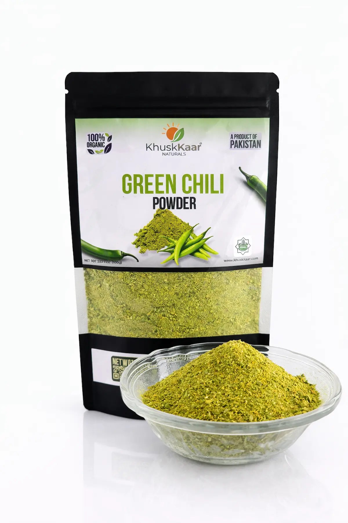 Fine dehydrator-dried green chili powder close-up showing natural color and texture