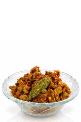 Prepared Instant Chicken Karahi Green Mirch served in a glass bowl by Khuskkaar Naturals