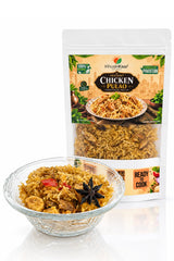 Prepared Instant Chicken Pulao served in a glass bowl with chicken and traditional pulao spices