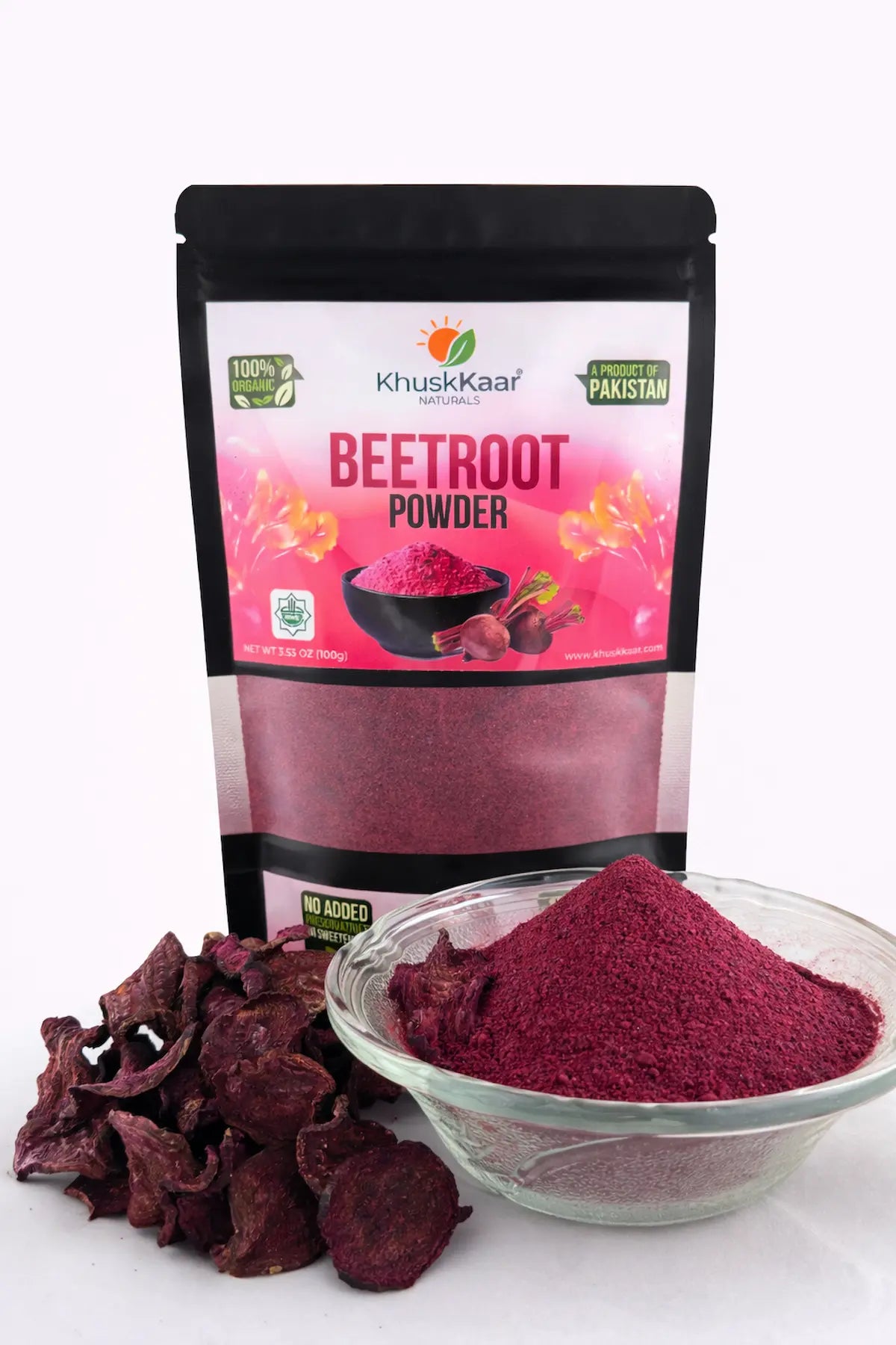 Fine dehydrator-dried beetroot powder close-up showing natural red color