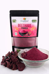 Fine dehydrator-dried beetroot powder close-up showing natural red color