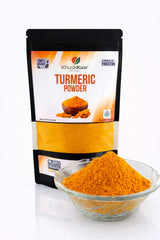 Fine dehydrator-dried turmeric powder close-up with rich golden color